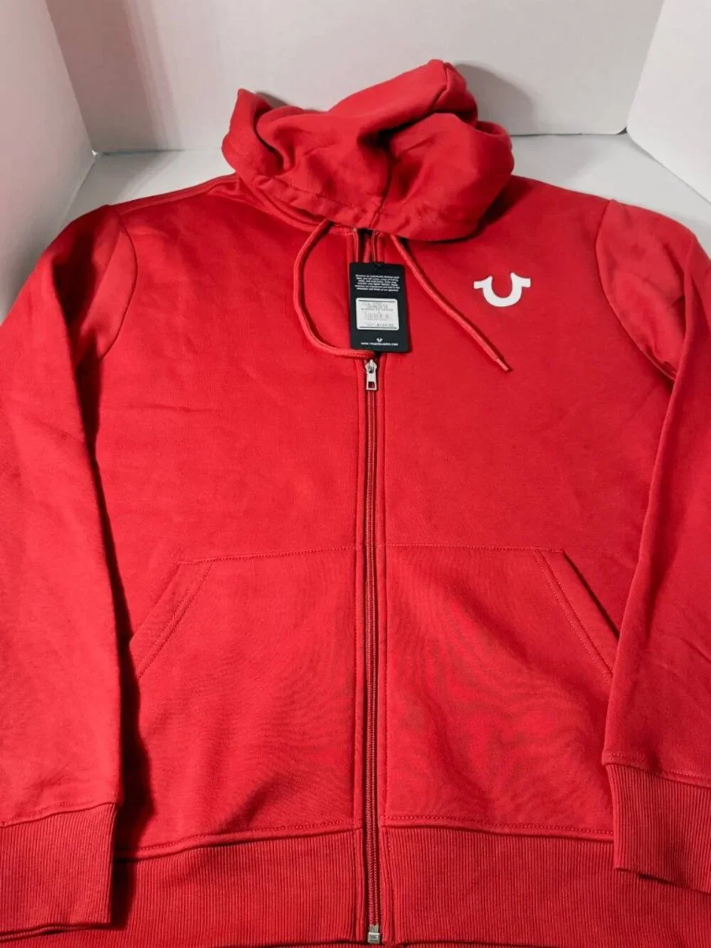 True religion hoody Size L men  with 2 pockets and front zipper  Red